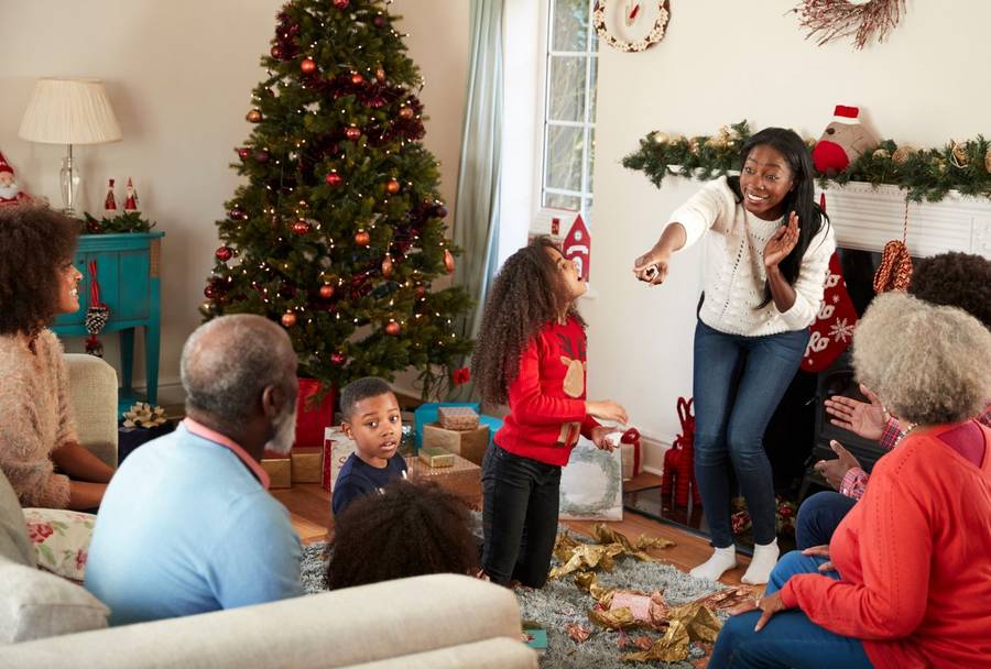 Family playing together at Christmas